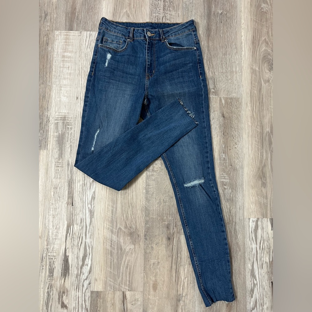 H&M high waisted skinny jeans, light distressing and a medium wash